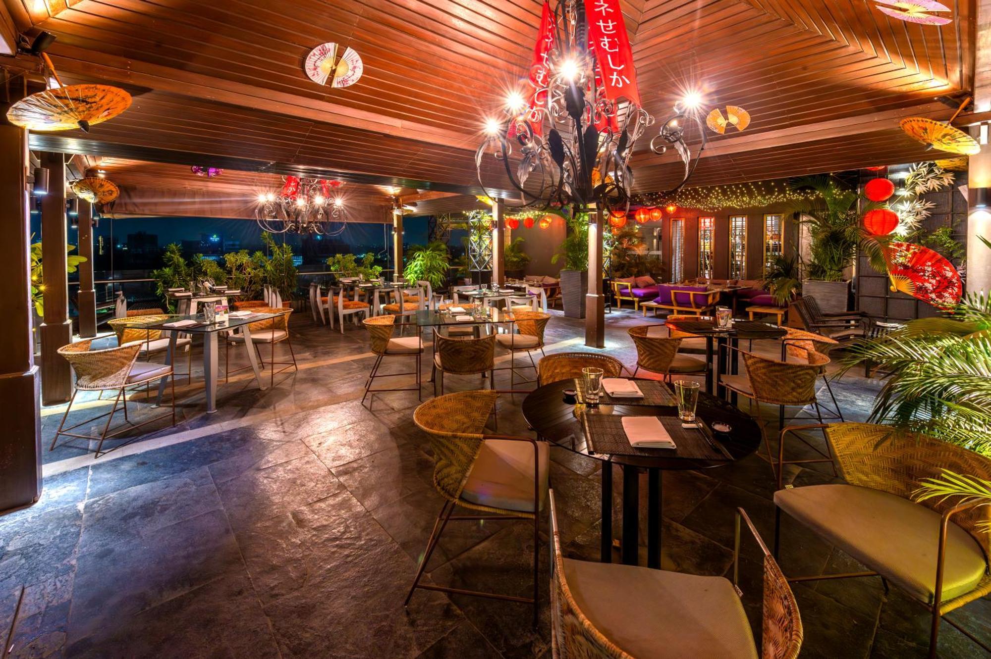 O Hotel Pune Exterior photo The interior of the restaurant